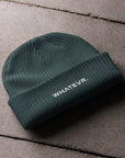 Unisex WHATEVR beanie in blue with embroidered detailing, front view