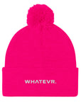 Unisex Signature pom pom knit beanie in pink with embroidered WHATEVR text, front view