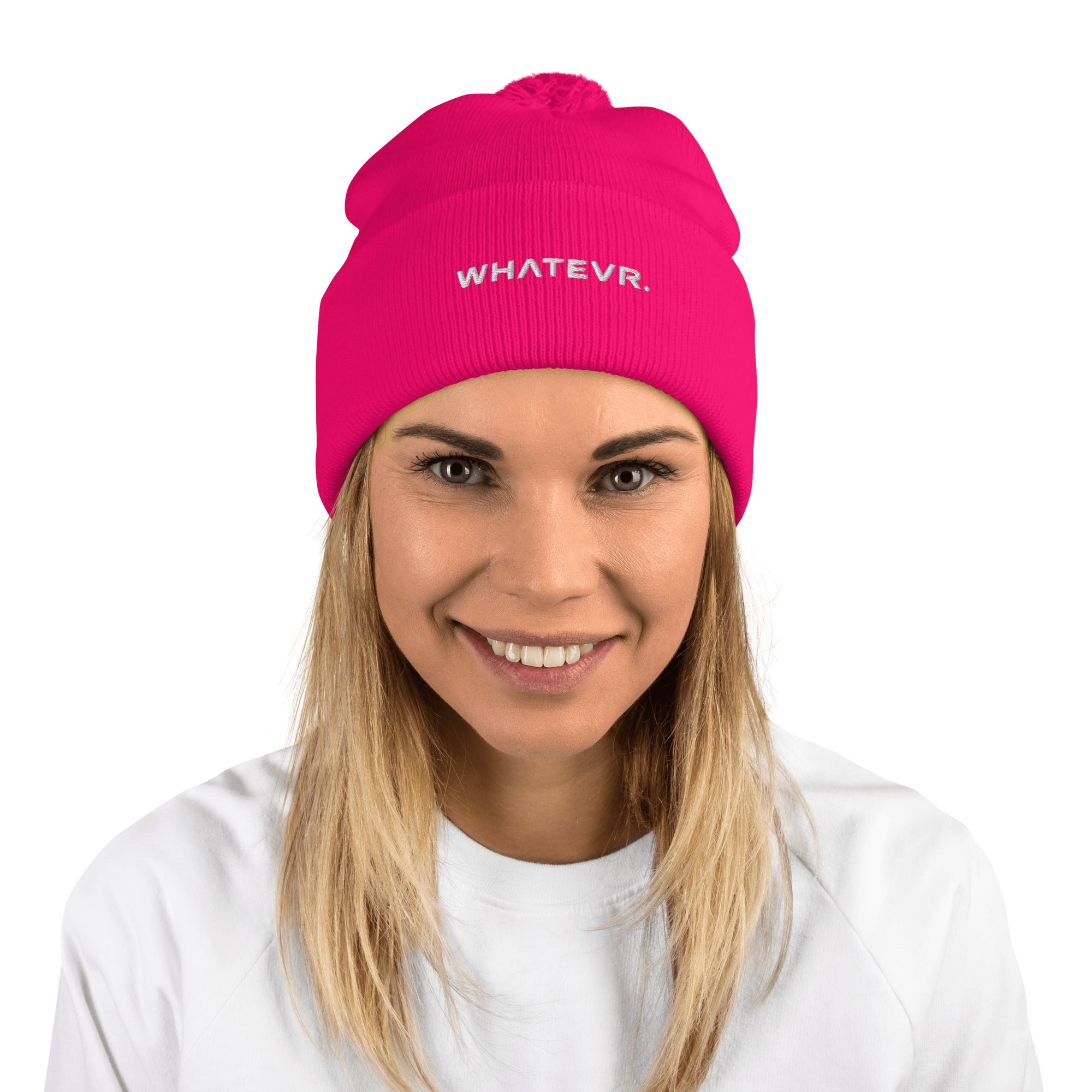 Unisex Signature pom pom knit beanie in pink with embroidered WHATEVR text, front view