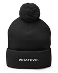 Unisex Signature pom pom knit beanie in black with embroidered WHATEVR text, front view