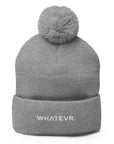 Unisex Signature pom pom knit beanie in gray with embroidered WHATEVR text, front view