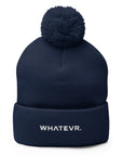 Unisex Signature pom pom knit beanie in blue with embroidered WHATEVR text, front view