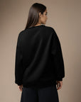 Women's premium sweatshirt in black, back view