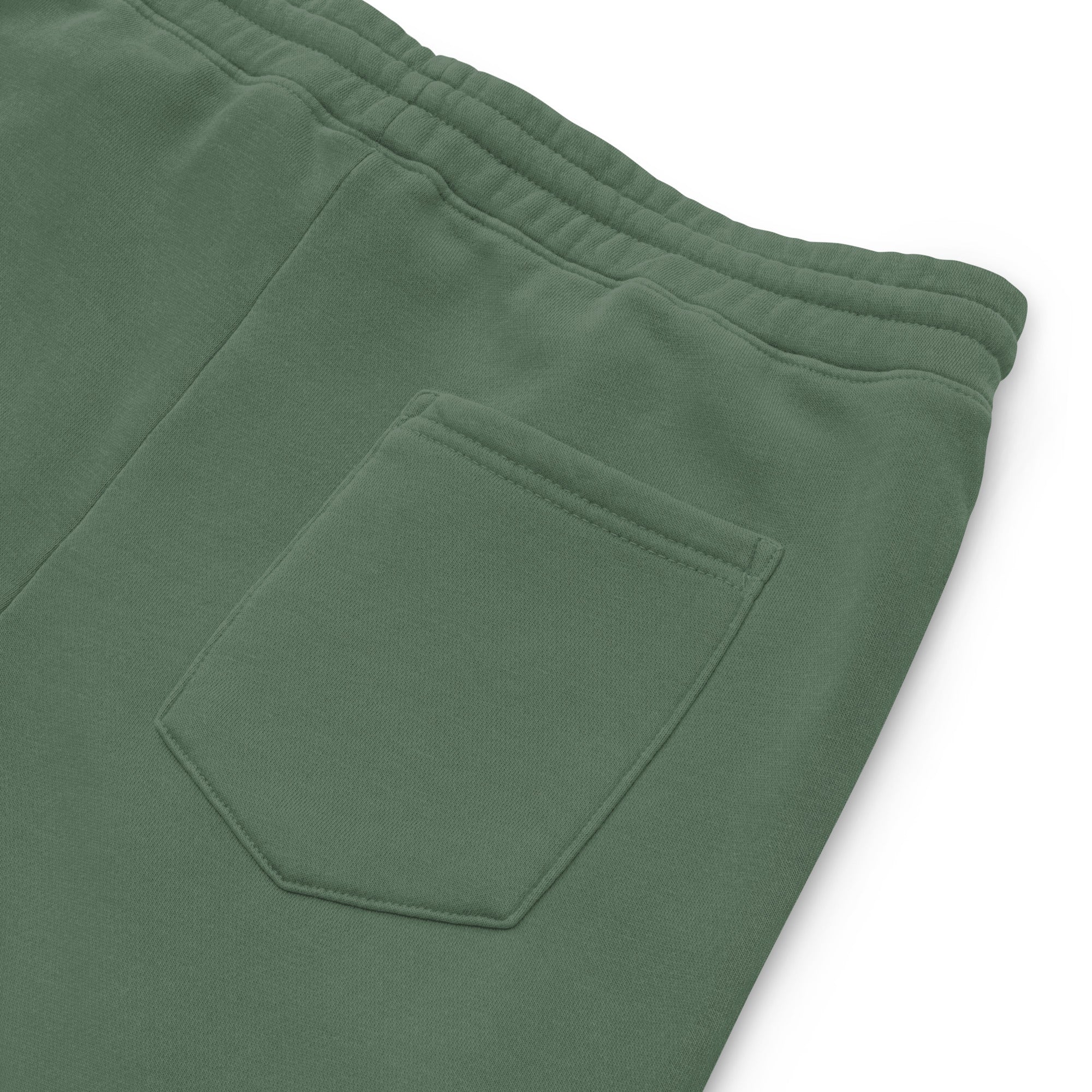 Women's essential relaxed sweatpants in green, back view.