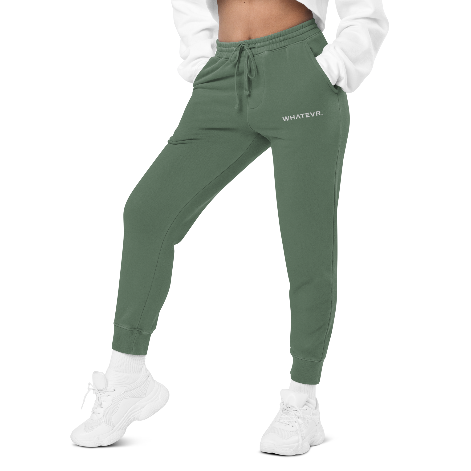 Women's essential relaxed sweatpants in green with embroidered detailing, front view.