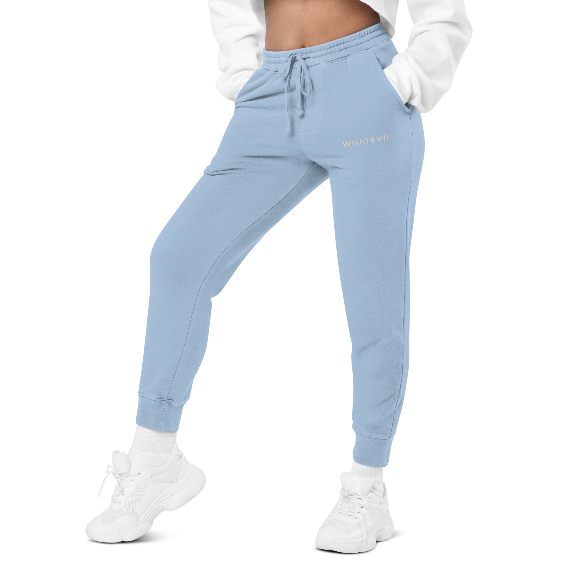 Women's essential relaxed sweatpants in light blue with embroidered detailing, front view.