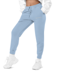 Women's essential relaxed sweatpants in light blue with embroidered detailing, front view.