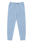 Women's essential relaxed sweatpants in light blue with embroidered detailing, front view.