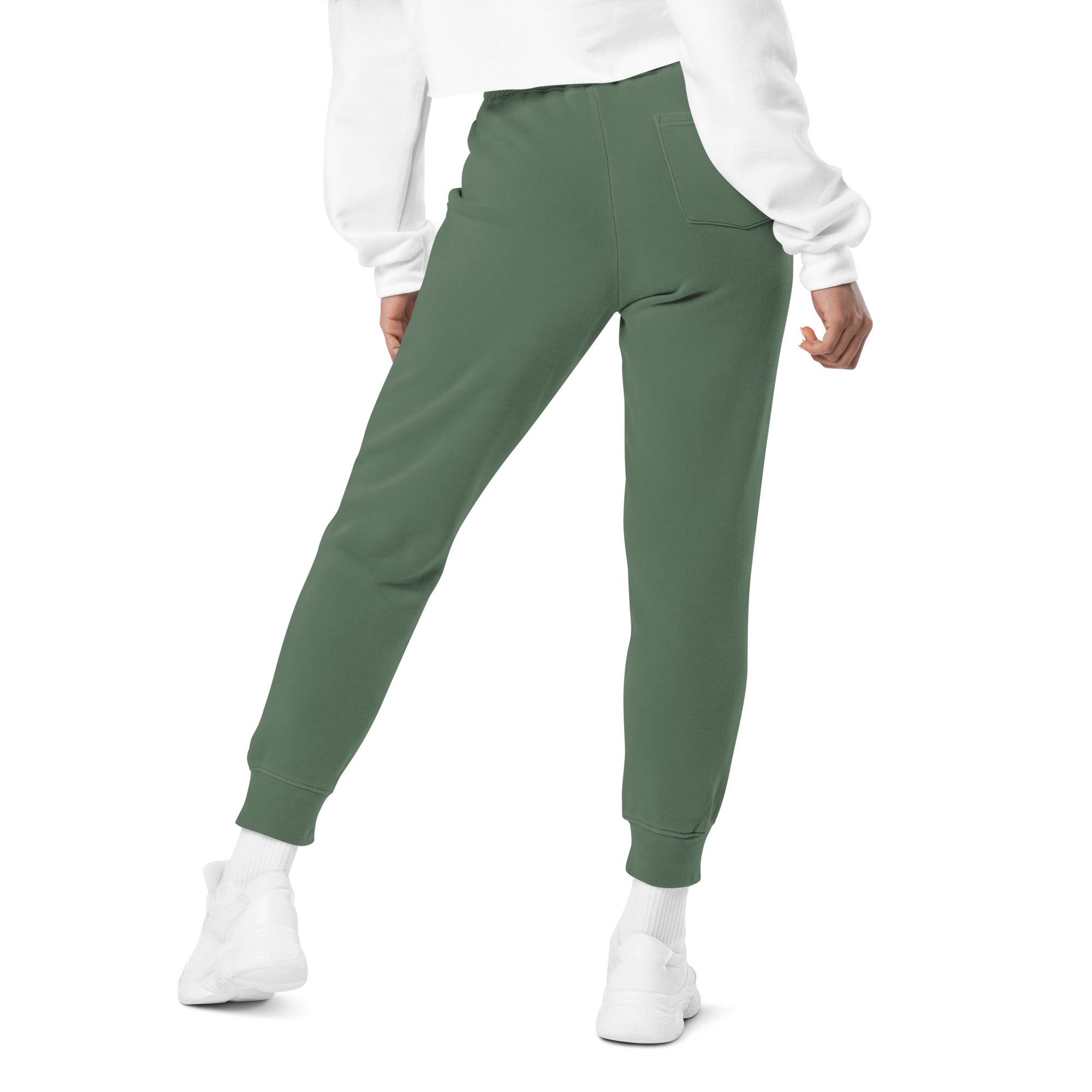 Women's essential relaxed sweatpants in green, back view.
