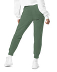 Women's essential relaxed sweatpants in green, back view.