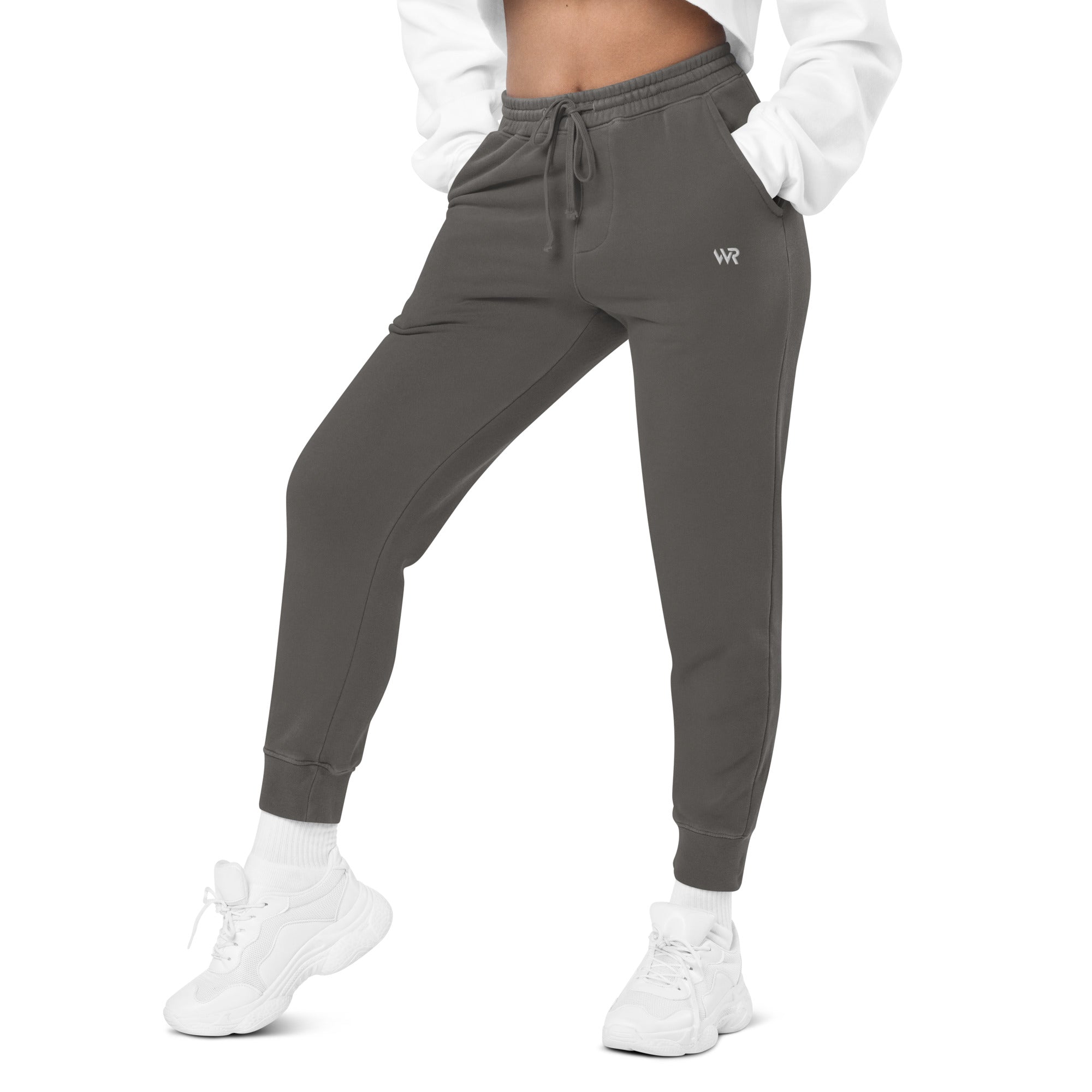Women's essential relaxed sweatpants in grey with embroidered detailing, front view.