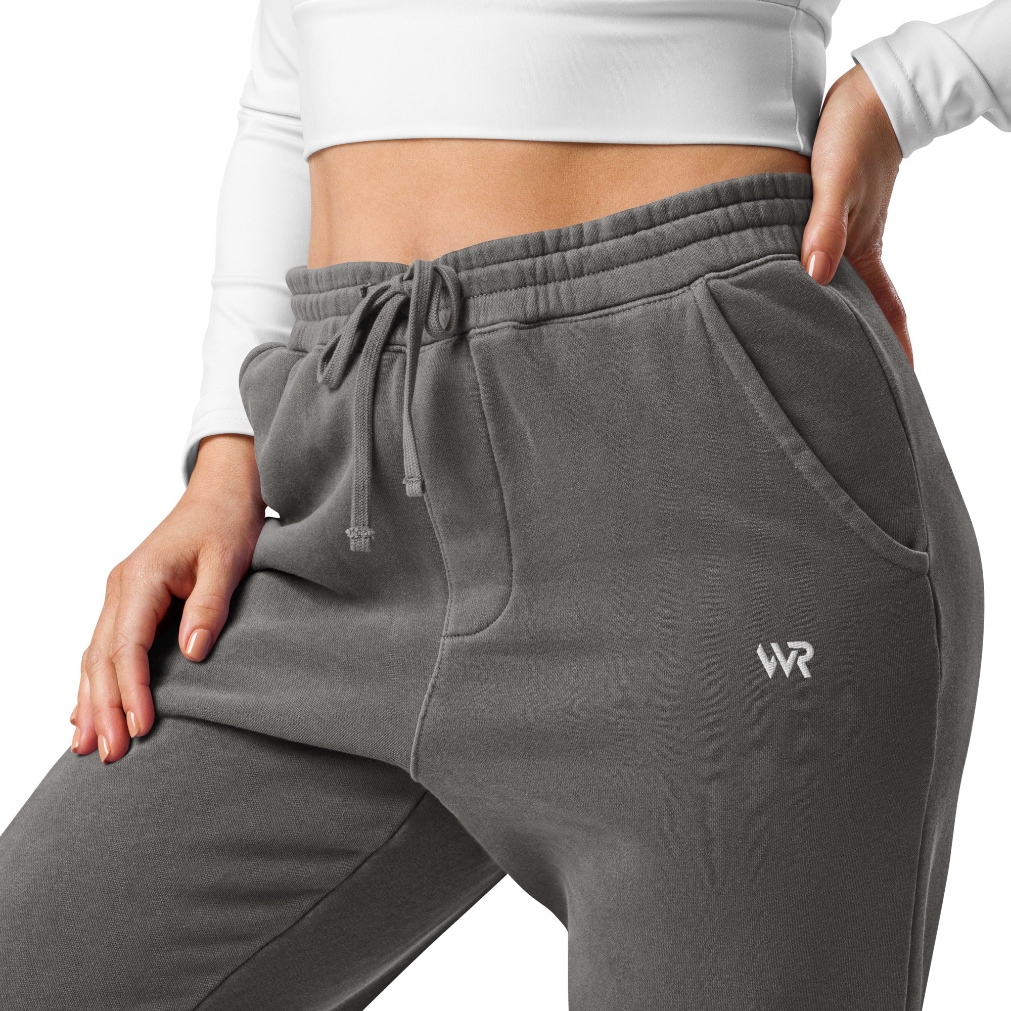 Women's essential relaxed sweatpants in grey with embroidered detailing, front view.