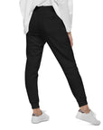 Women's essential slim fit sweatpants in black, back view.