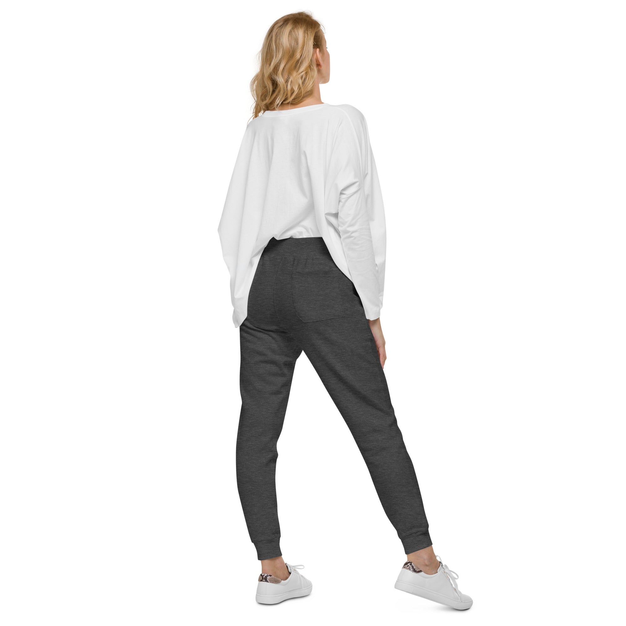 Women's essential slim fit sweatpants in dark grey, back view.