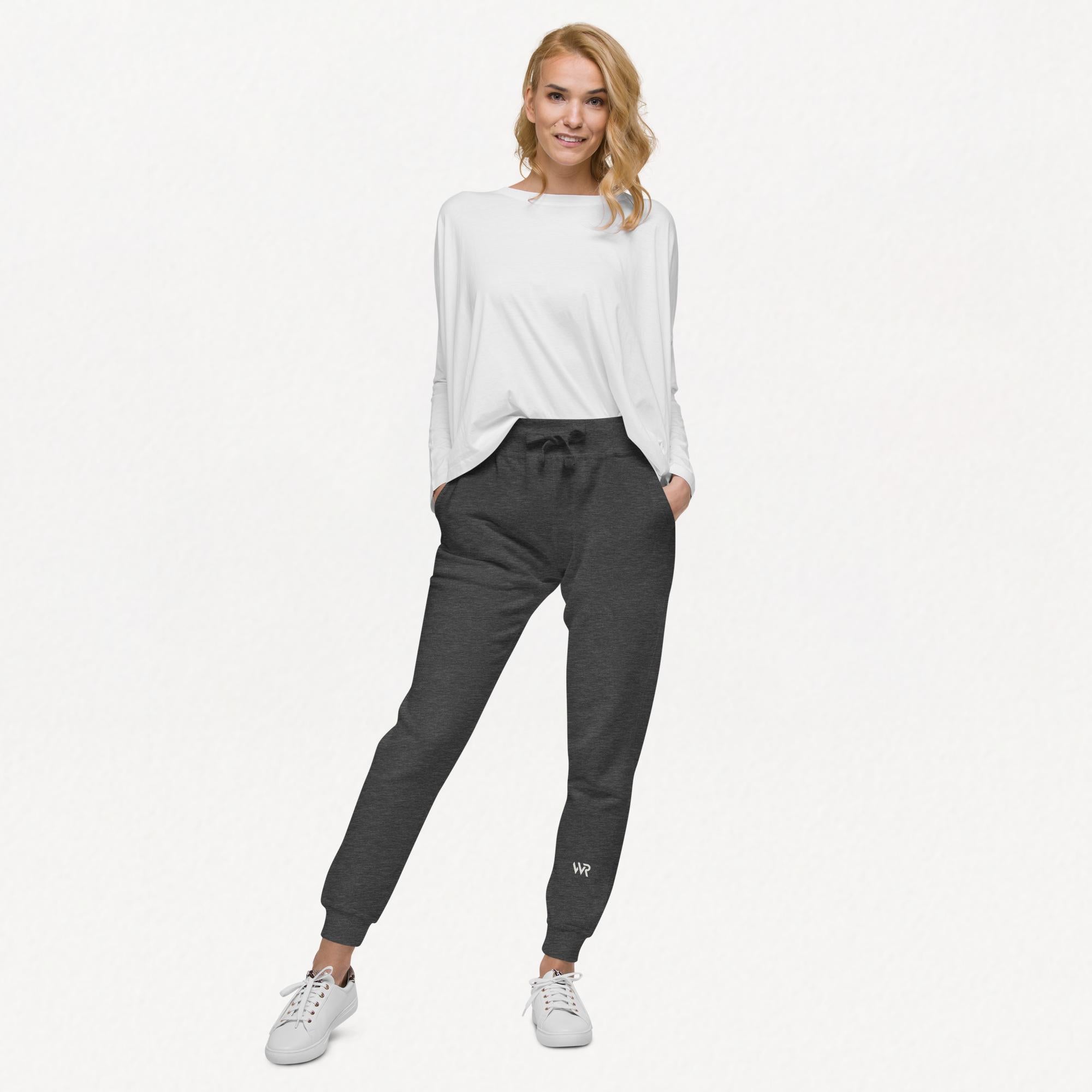 Women's essential slim fit sweatpants in dark grey, front view.