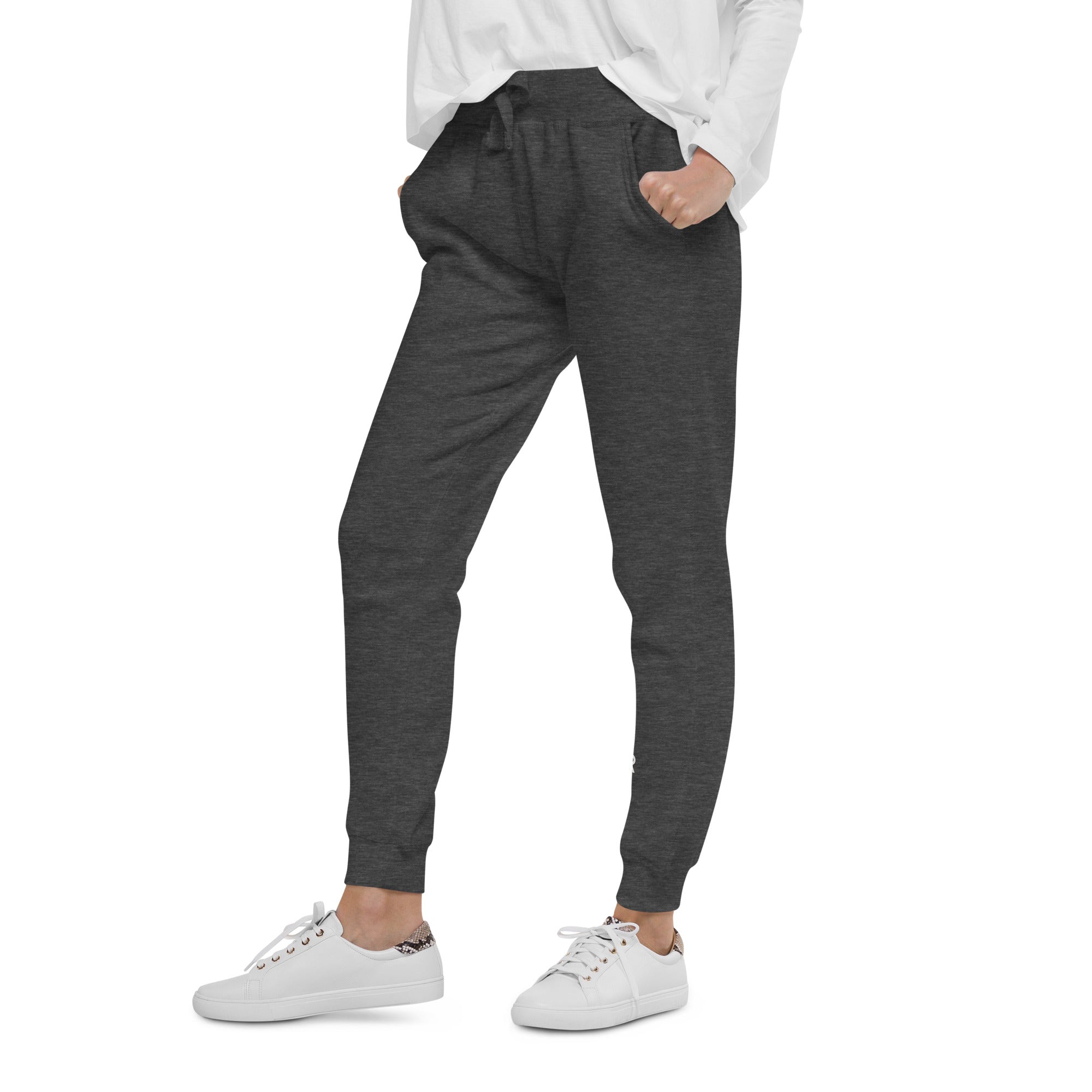 Women's essential slim fit sweatpants in dark grey, side view.