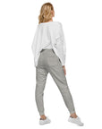 Women's essential slim fit sweatpants in grey, back view.