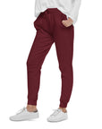 Women's essential slim fit sweatpants in maroon, side view.