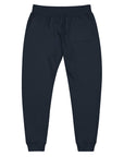 Women's essential slim fit sweatpants in dark blue, back view.
