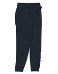 Women's essential slim fit sweatpants in dark blue, side view.