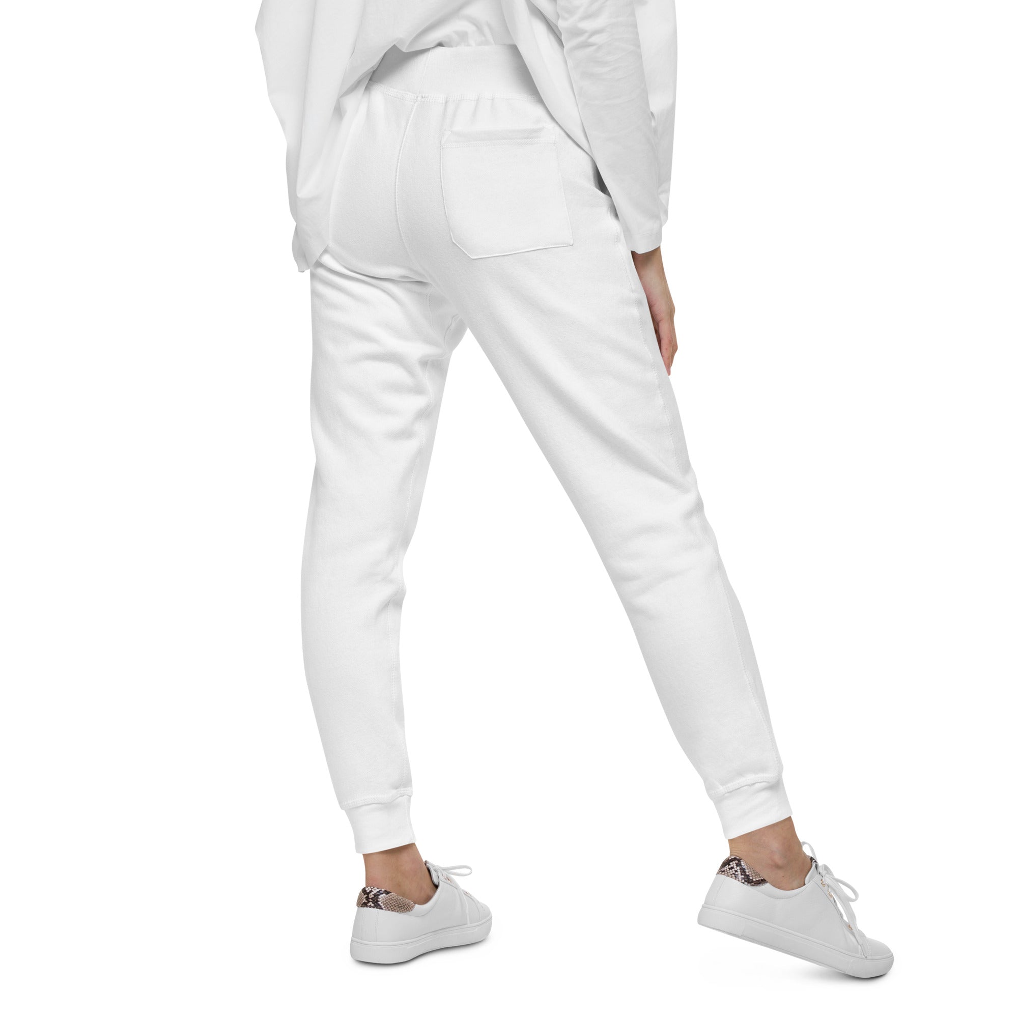 Women's essential slim fit sweatpants in white, side view.