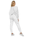 Women's essential slim fit sweatpants in white, back view.