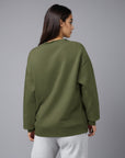 Women's premium sweatshirt in green, back view