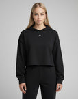 Women's cropped hoodie in black with "WR" text, front view.