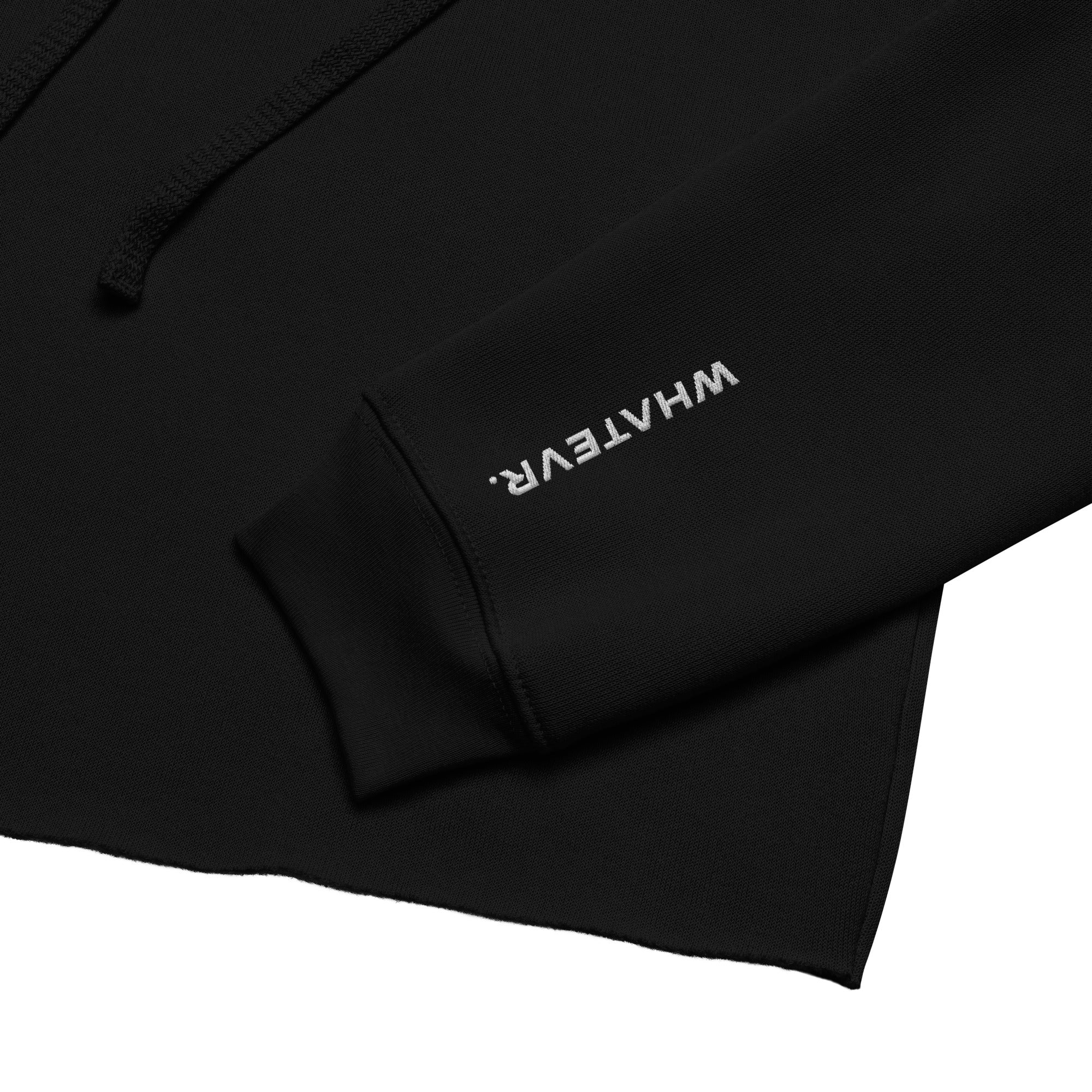 Women's cropped hoodie in black with "WHATEVR" text, side view.