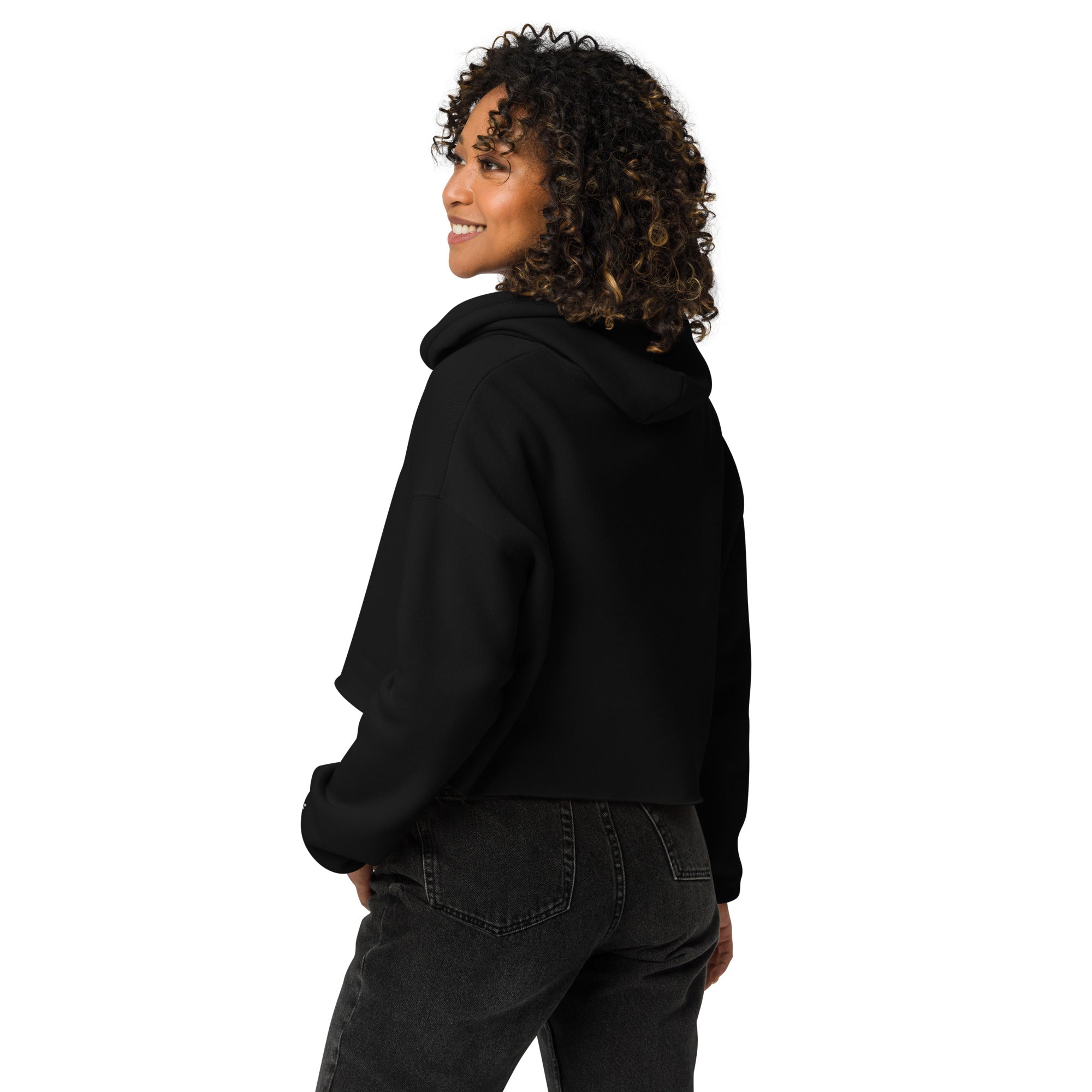 Women's cropped hoodie in black, side view.