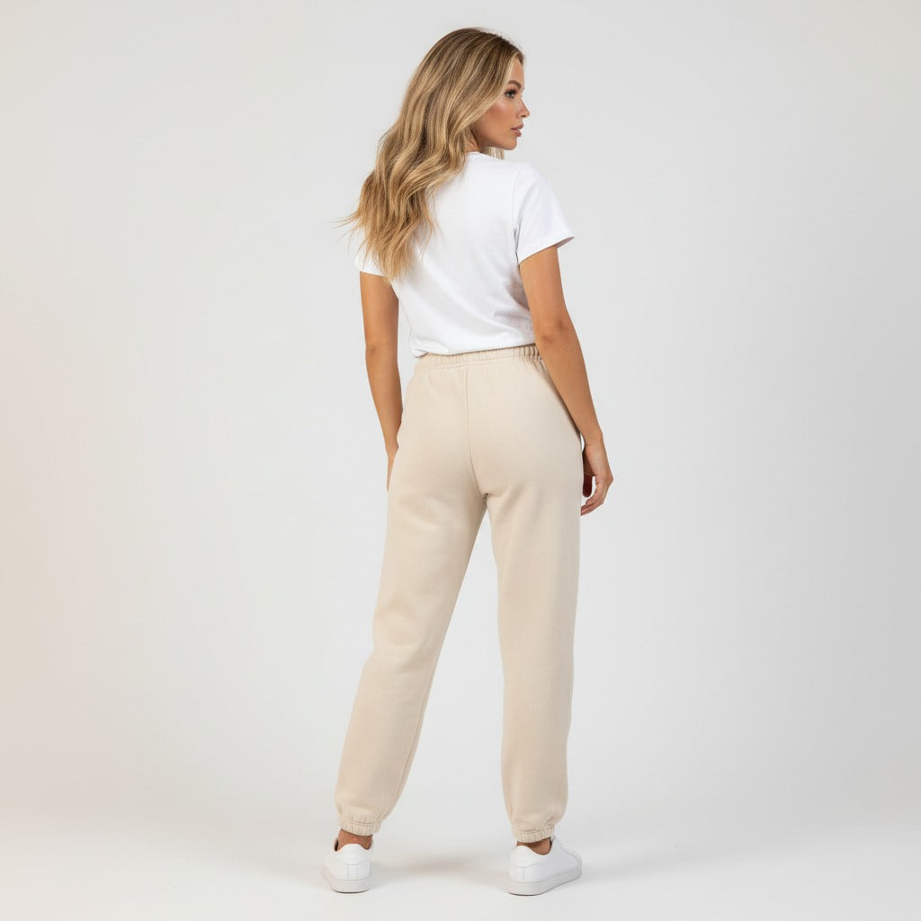 Women's premium heavyweight sweatpants in beige, back view