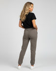 Women's premium heavyweight sweatpants in dark grey, back view.