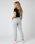 Women's premium heavyweight sweatpants in light grey, back view.