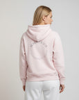 Women's premium heavyweight hoodie in lilac with "Confidence Worn" text, back view.