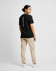 Women's premium t-shirt in black, back view