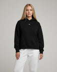 Women's premium heavyweight hoodie in black with "WR" logo, front view.