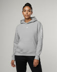 Women's premium heavyweight hoodie in heather grey with "WR" logo, front view.