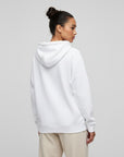 Women's premium heavyweight hoodie in white, back view.