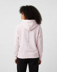 Women's premium heavyweight hoodie in pink with "WHATEVR" text, back view.