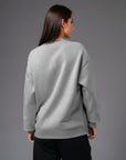 Women's premium crewneck sweatshirt in light grey with embroidered detailing, back view