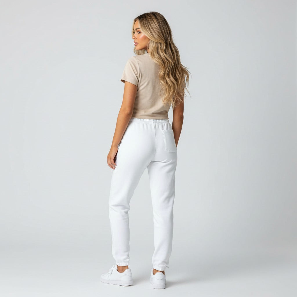 Women's heavyweight fleece sweatpants in white, back view.