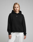 Women's premium heavyweight hoodie in black with "WR" text, front view.